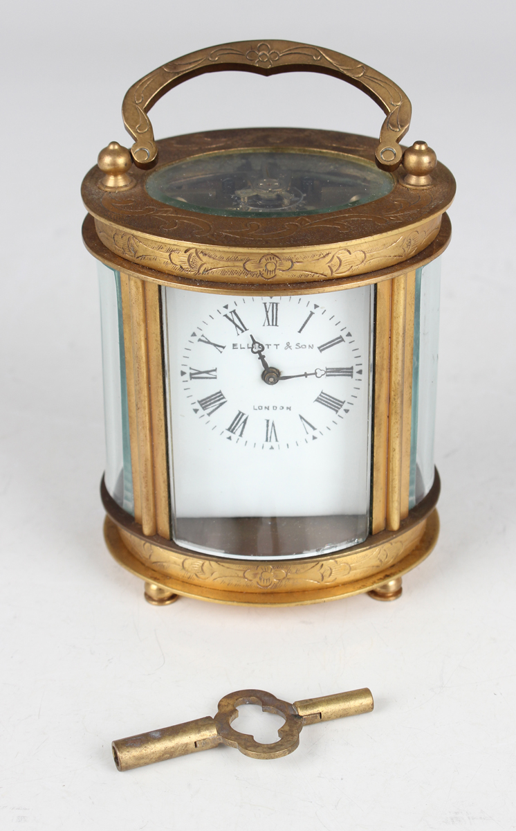 A 20th century Chinese brass oval cased carriage timepiece, the enamelled dial with black Roman hour - Image 2 of 8