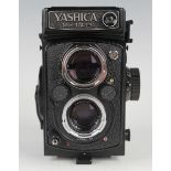 A Yashica Mat-124G twin lens reflex camera, No. 9012436, with Yashinon 1:2.8 f=80mm and Yashinon 1:
