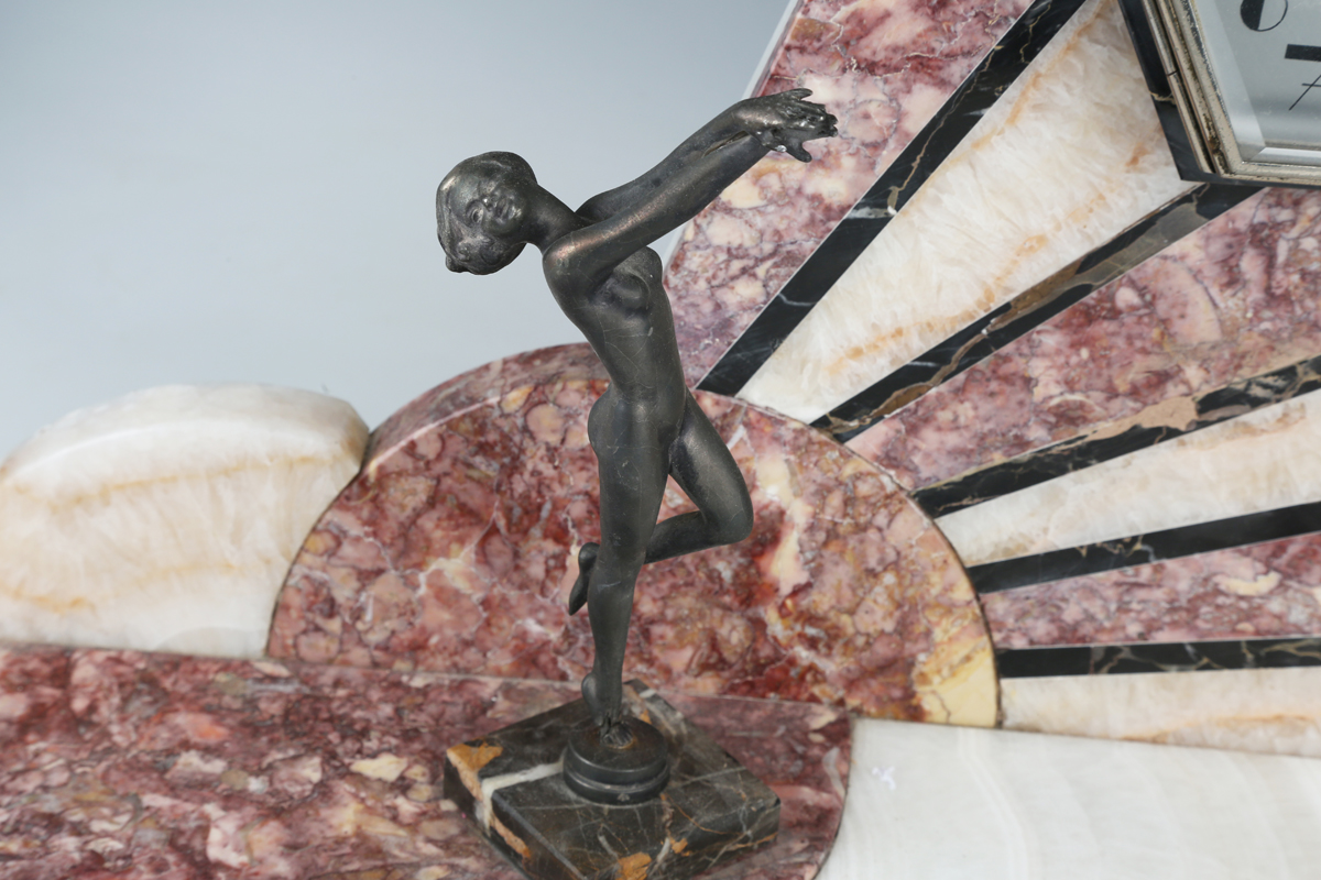 An Art Deco rouge marble, onyx, slate and spelter mantel clock with eight day movement striking on a - Image 8 of 9