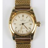 A Rolex Oyster Precision gilt metal fronted and steel backed gentleman's wristwatch, the signed