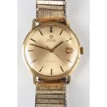 An Omega Automatic gold circular cased gentleman's wristwatch, the signed matt gilt dial with