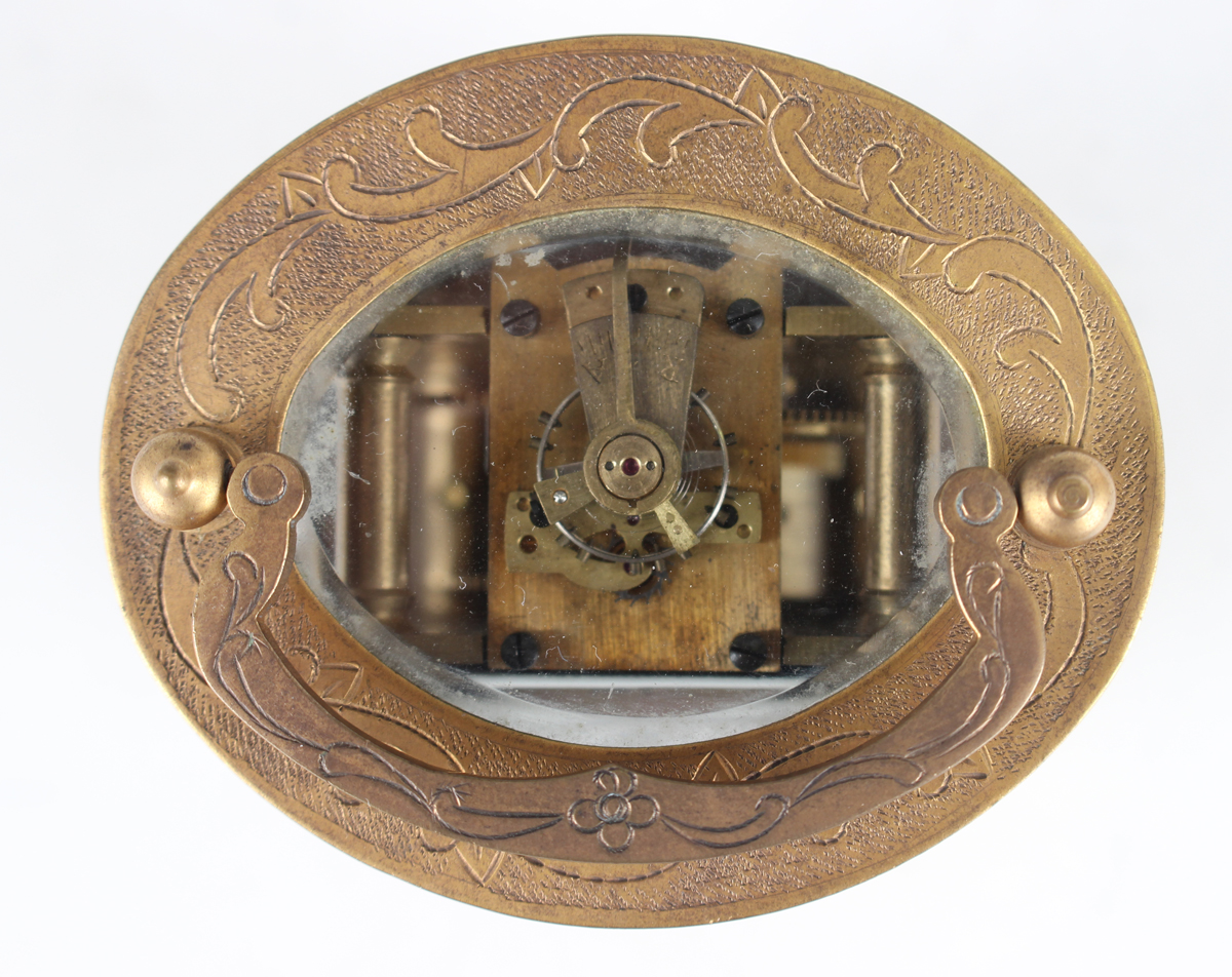 A 20th century Chinese brass oval cased carriage timepiece, the enamelled dial with black Roman hour - Image 3 of 8