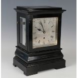 A Victorian ebonized mantel timepiece with eight day single fusee movement, the 6-inch square