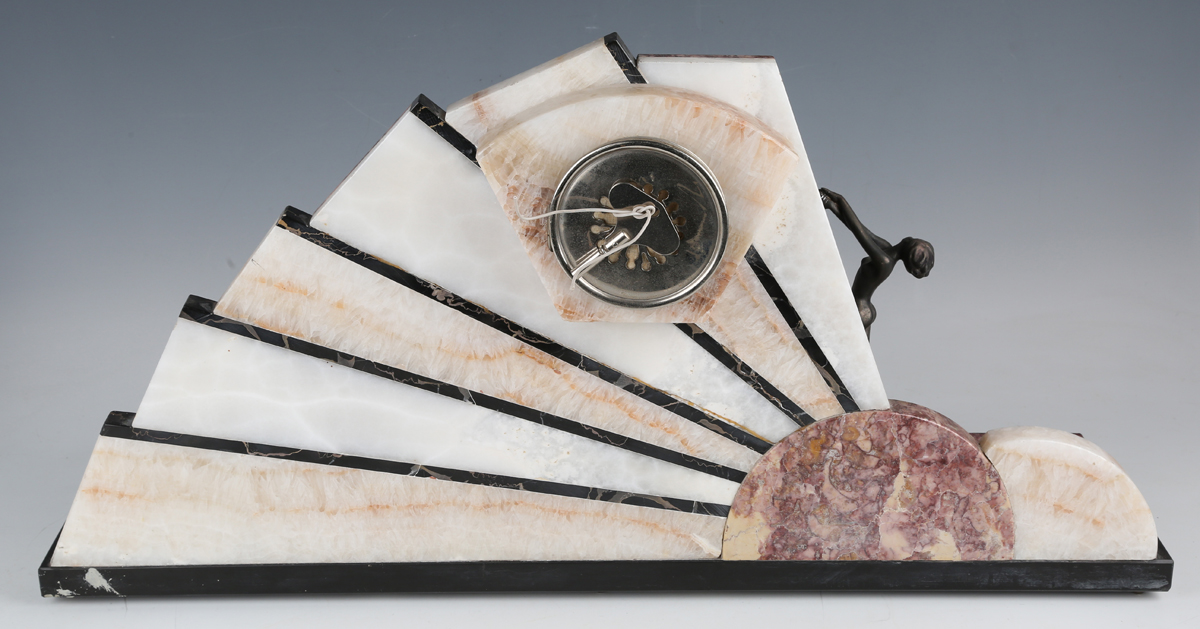 An Art Deco rouge marble, onyx, slate and spelter mantel clock with eight day movement striking on a - Image 3 of 9