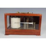 A late 20th century barograph by Casella of London, within a hardwood case with glazed hinged cover,