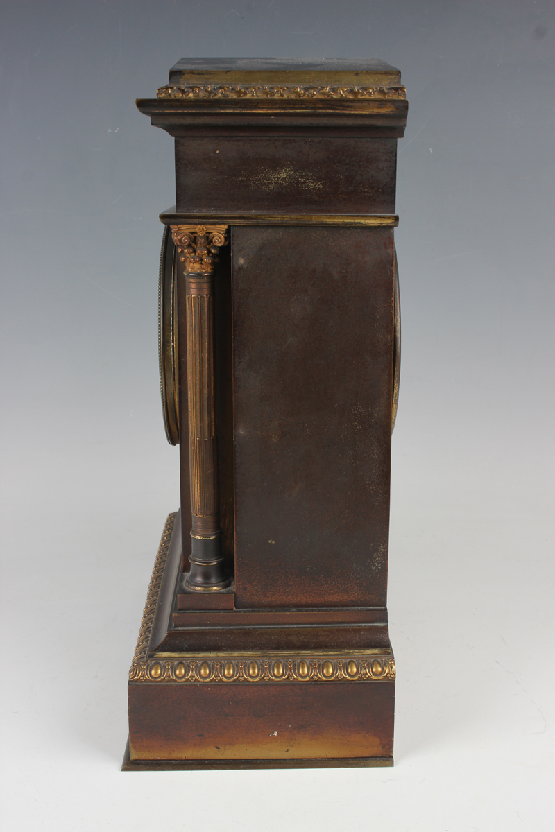 A late 19th century French brown patinated brass and porcelain mounted mantel clock with eight day - Image 4 of 9