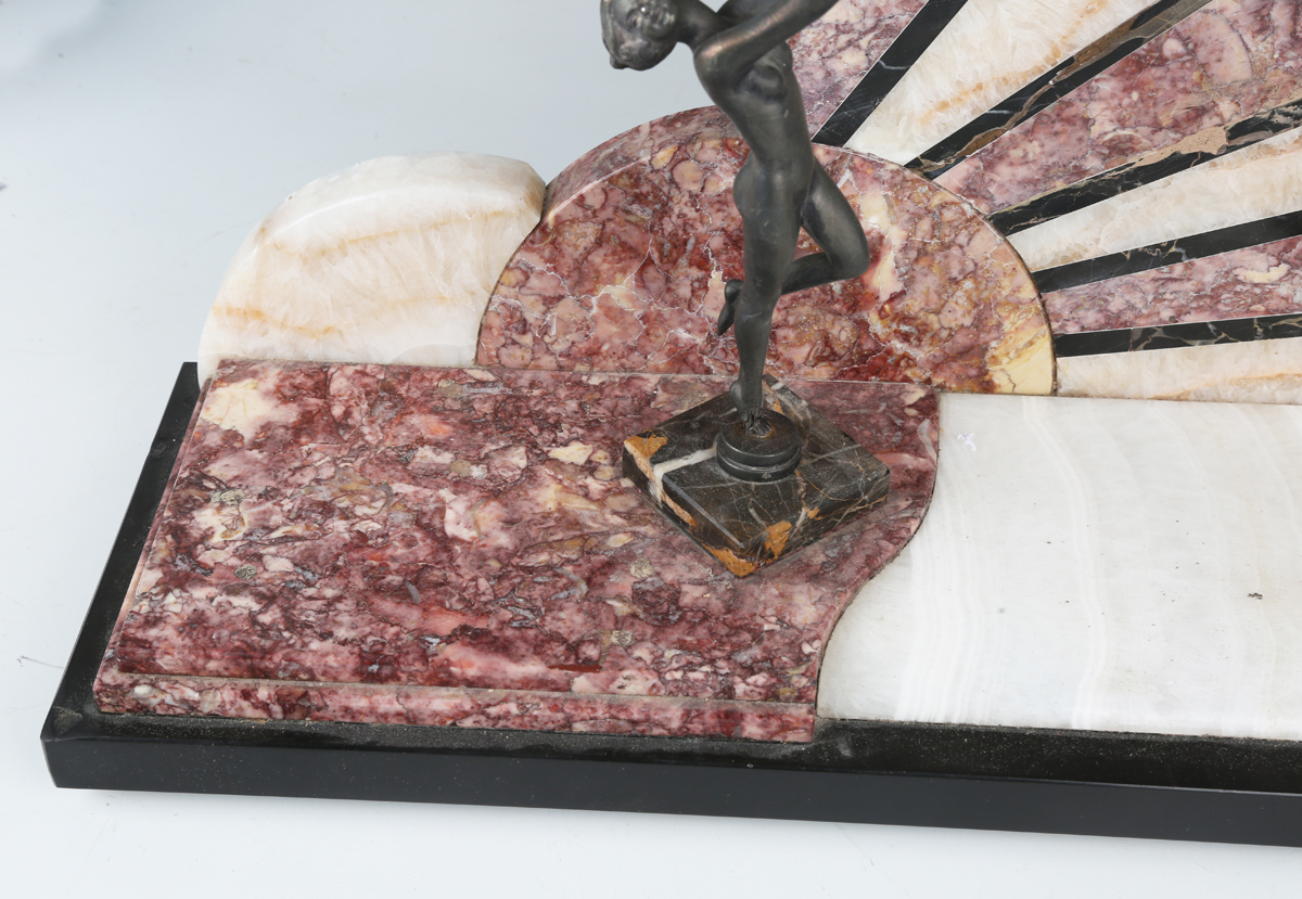 An Art Deco rouge marble, onyx, slate and spelter mantel clock with eight day movement striking on a - Image 6 of 9