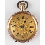 A 9ct gold cased keyless wind open-faced lady's fob watch with gilt cylinder movement, base metal