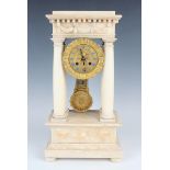 A late 19th century French alabaster portico mantel clock with eight day movement striking on a bell