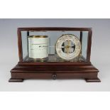 A 20th century stained beech cased barograph with silvered barometer dial and mercury thermometer,