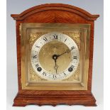 A 20th century mahogany mantel clock by F.W. Elliott & Co, the signed eight day movement with