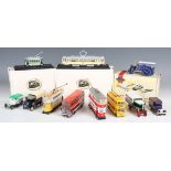 A collection of diecast metal and plastic vehicles, including nineteen Atlas Editions model trams,