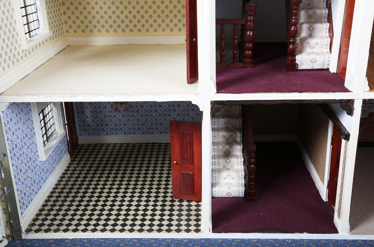 A 20th century Tudor style doll's house, the double-gabled tiled roof above a double opening front - Image 15 of 21