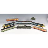 A collection of gauge OO/HO railway items, including Bachmann The Centennial DD40X locomotive,