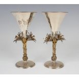 A pair of Elizabeth II Aurum silver and parcel gilt Blackburn Cathedral goblets, commemorating the