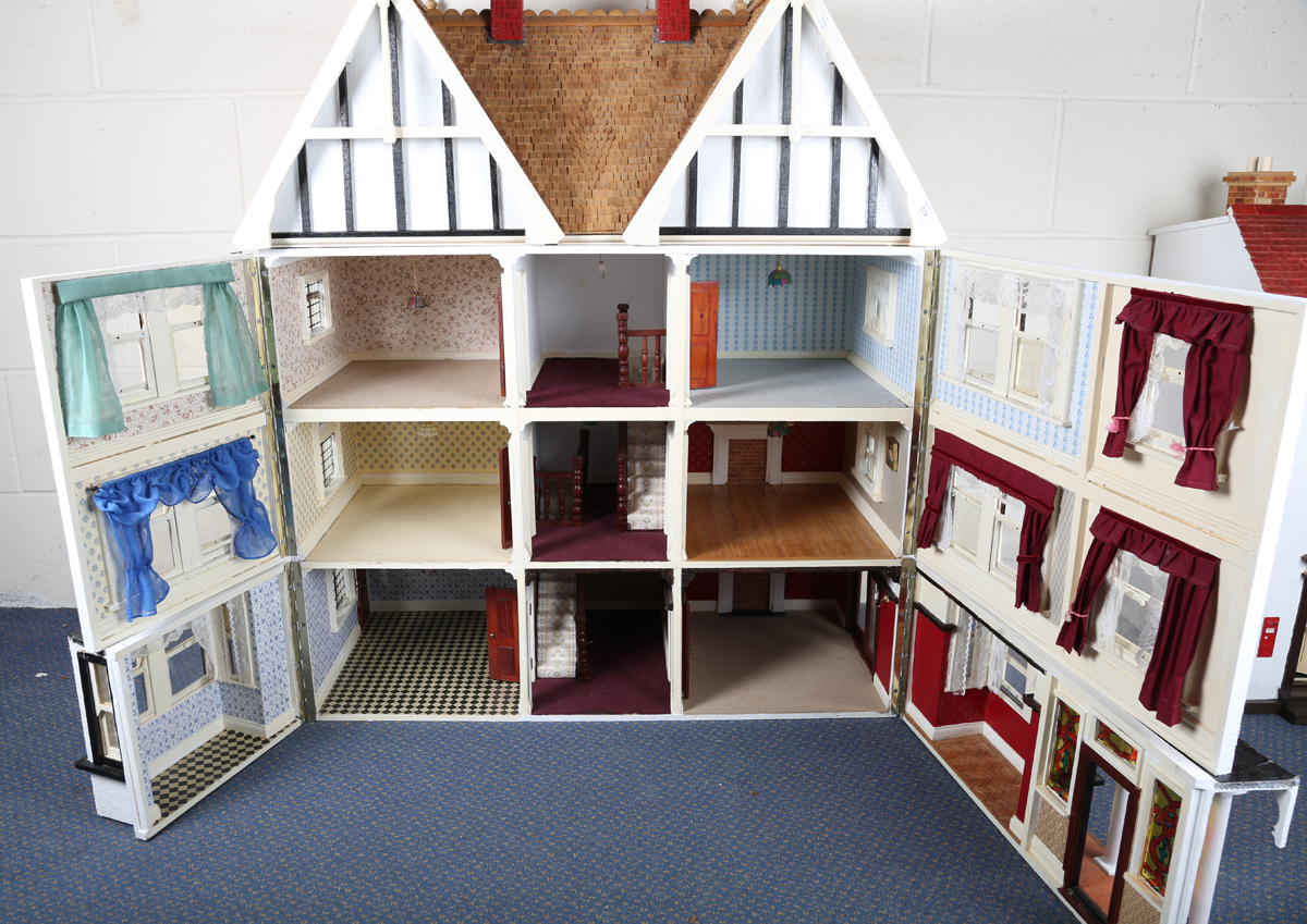 A 20th century Tudor style doll's house, the double-gabled tiled roof above a double opening front - Image 18 of 21