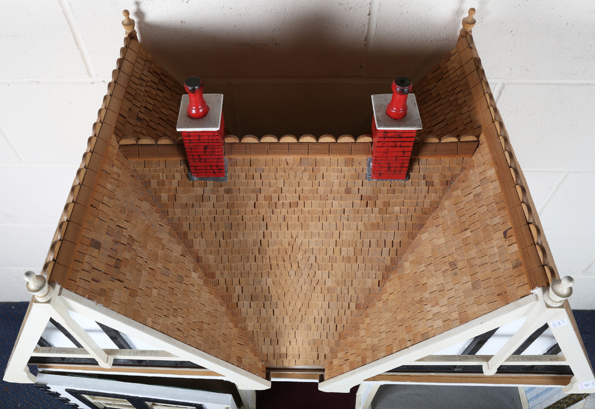 A 20th century Tudor style doll's house, the double-gabled tiled roof above a double opening front - Image 9 of 21