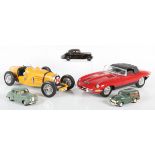 A small collection of diecast vehicles, including Lansdowne Models 1953 Austin Somerset, Crossways