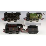 A Hornby gauge O clockwork locomotive 60189 and tender, BR black, and two tank locomotives, 460,