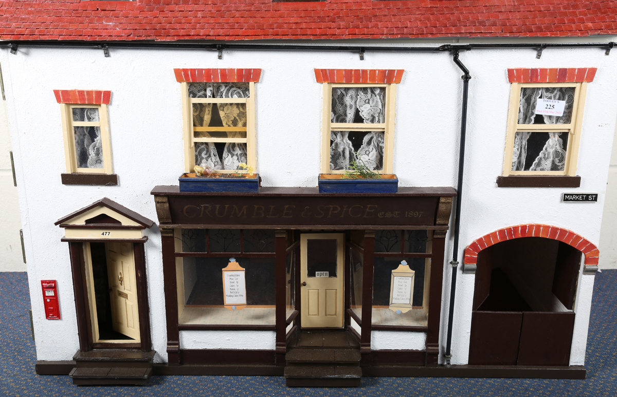A doll's house baker's shop 'Crumble & Spice', the hinged dormer roof revealing a landing and two - Image 16 of 17