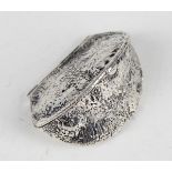 A .925 sterling novelty box in the form of a Brazil nut, length 5.3cm.Buyer’s Premium 29.4% (