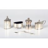 An Edward VIII silver matched three-piece oval condiment set with reeded rims, comprising pepper