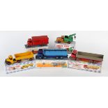 Five Dinky Toys and Supertoys commercial vehicles, including No. 504 Foden 14-ton tanker, duo