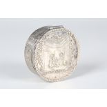 A 19th century Dutch silver circular snuff box, the hinged lid and sides decorated in relief with