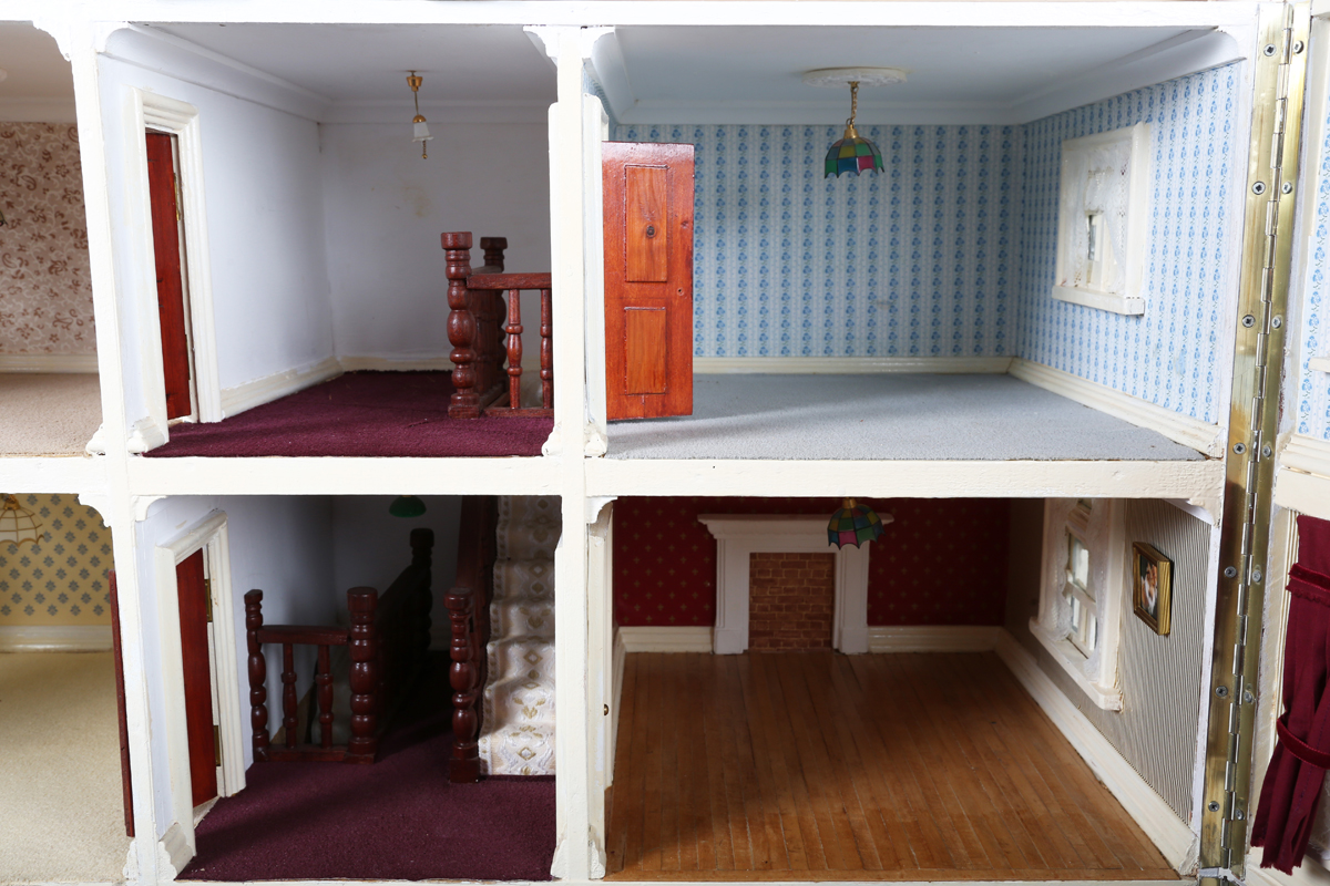 A 20th century Tudor style doll's house, the double-gabled tiled roof above a double opening front - Image 16 of 21