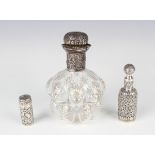 A late Victorian silver mounted cut glass scent bottle and silver mounted stopper, the lobed body