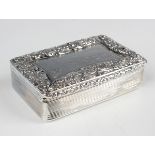 A William IV silver rectangular snuff box, the hinged lid engraved with a hunting scene framed by