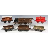 A Hornby gauge O clockwork 4-4-2 locomotive 31801 and tender, Nord brown, together with an open