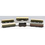 A pre-war Trix Twin Railway gauge OO motor bogie coach 11081 Southern, three further coaches, an 0-