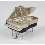 A Continental .925 silver model of a grand piano, length 8.2cm.Buyer’s Premium 29.4% (including