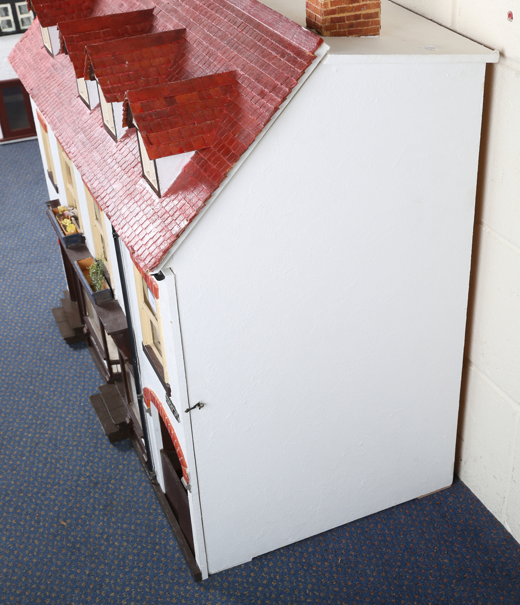 A doll's house baker's shop 'Crumble & Spice', the hinged dormer roof revealing a landing and two - Image 15 of 17