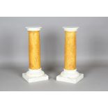 A pair of 20th century pedestals, painted to simulate Carrara and Sienna marble, height 71cm,