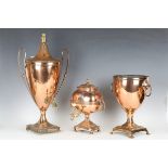 A Regency copper samovar, the body with applied silver plaque and finely cast lion mask handles,
