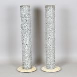 A pair of 19th century grey marble pedestals, each raised on a separate circular plinth, height
