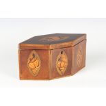 A George III mahogany tea caddy of navette form, the hinged lid and sides inlaid with shell