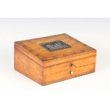 A Regency satinwood and tulipwood crossbanded needlework box, the hinged lid with applied metal