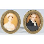 William John Thompson - a pair of 19th century watercolour on ivory portrait miniatures, depicting a