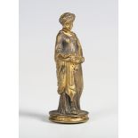 A fine late 19th century gilt metal figural desk seal, the handle cast in the form of a young lady