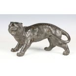An early 20th century patinated cast bronze model of a snarling tiger, possibly Japanese, length