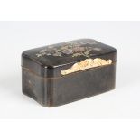 A mid-19th century tortoiseshell and gilt metal mounted shaped rectangular snuff box, the hinged lid