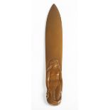 Renee Vautier - an early 20th century French brown patinated bronze paperknife, the handle finely