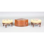 A pair of Victorian walnut footstools, diameter 28cm, together with a 19th century mahogany corner