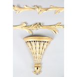 A late 19th century giltwood wall bracket of stiff leaf tapering form, height 31cm, width 26cm,