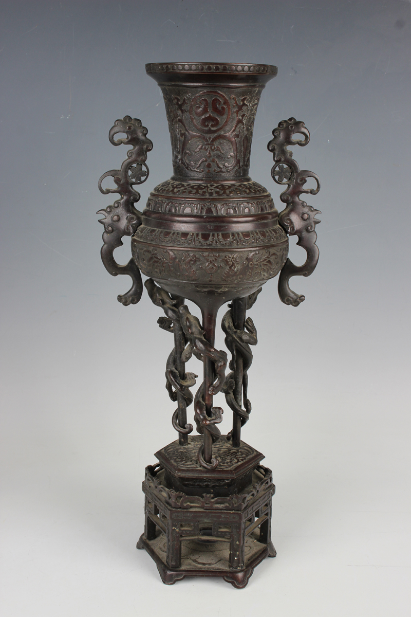 A pair of Japanese brown patinated bronze two-handled vases and integral stands, Meiji period, - Image 5 of 17