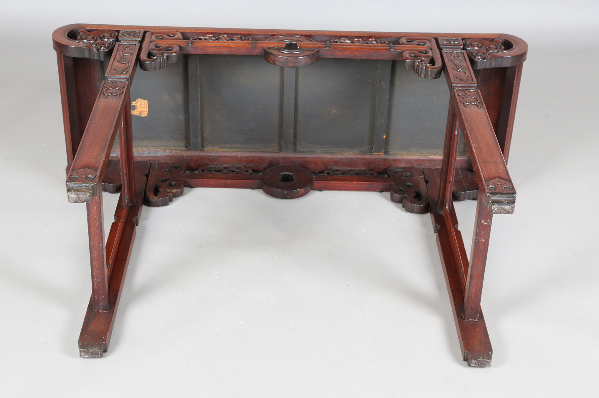 A Chinese hardwood altar table, 20th century, the rectangular panelled top with curved ends, the - Image 7 of 28