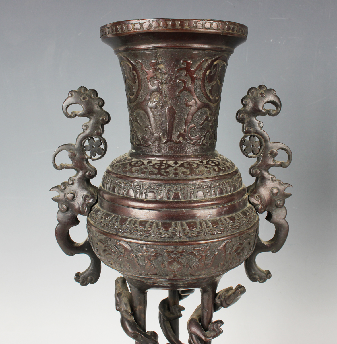 A pair of Japanese brown patinated bronze two-handled vases and integral stands, Meiji period, - Image 16 of 17